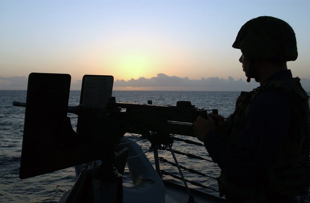 Sonar technician (surface) Petty Officer 3rd Class Harold E. Balzer, assigned to guided-missile destroyer USS Bainbridge, stands force protection watch during a maritime interdiction operations exercise in the Indian Ocean on Sept. 24, 2007. (U.S. Navy photo)