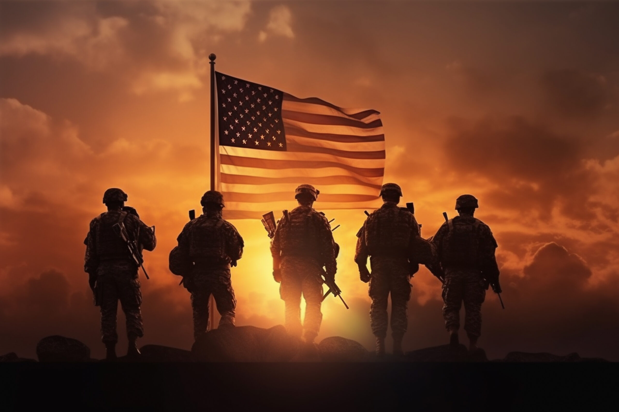 American soldiers silhouetted by a sunset. The American flag prominent int he background.