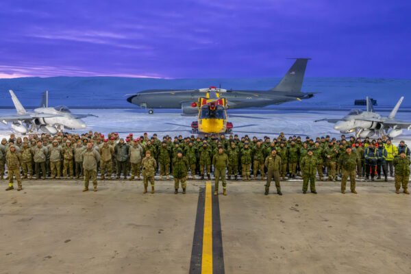Members of the binational Air Task Force (ATF) pose for a group photo at Pituffik Space Base, Greenland, on Jan. 29, 2026, as part of Operation NOBLE DEFENDER, an exercise designed to validate NORAD’s capability to defend Canada and the United States. (Royal Canadian Air Force Photo by Master Cpl. Bélynda Casse, 3 Wing Bagotville)